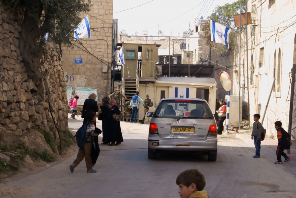 Settler car near Hebron checkpoint between H1 & H2